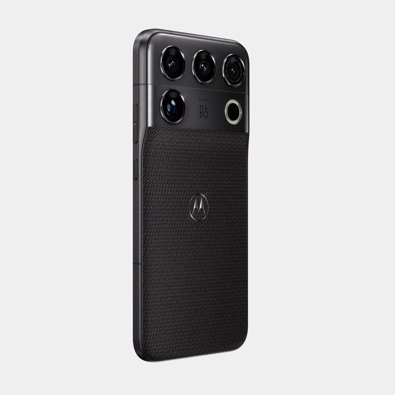 The Motorola Signature 27's camera module in profile, with the "Audio by B&O" wordmark visible between the lenses on the olive-gold Capulet Green finish