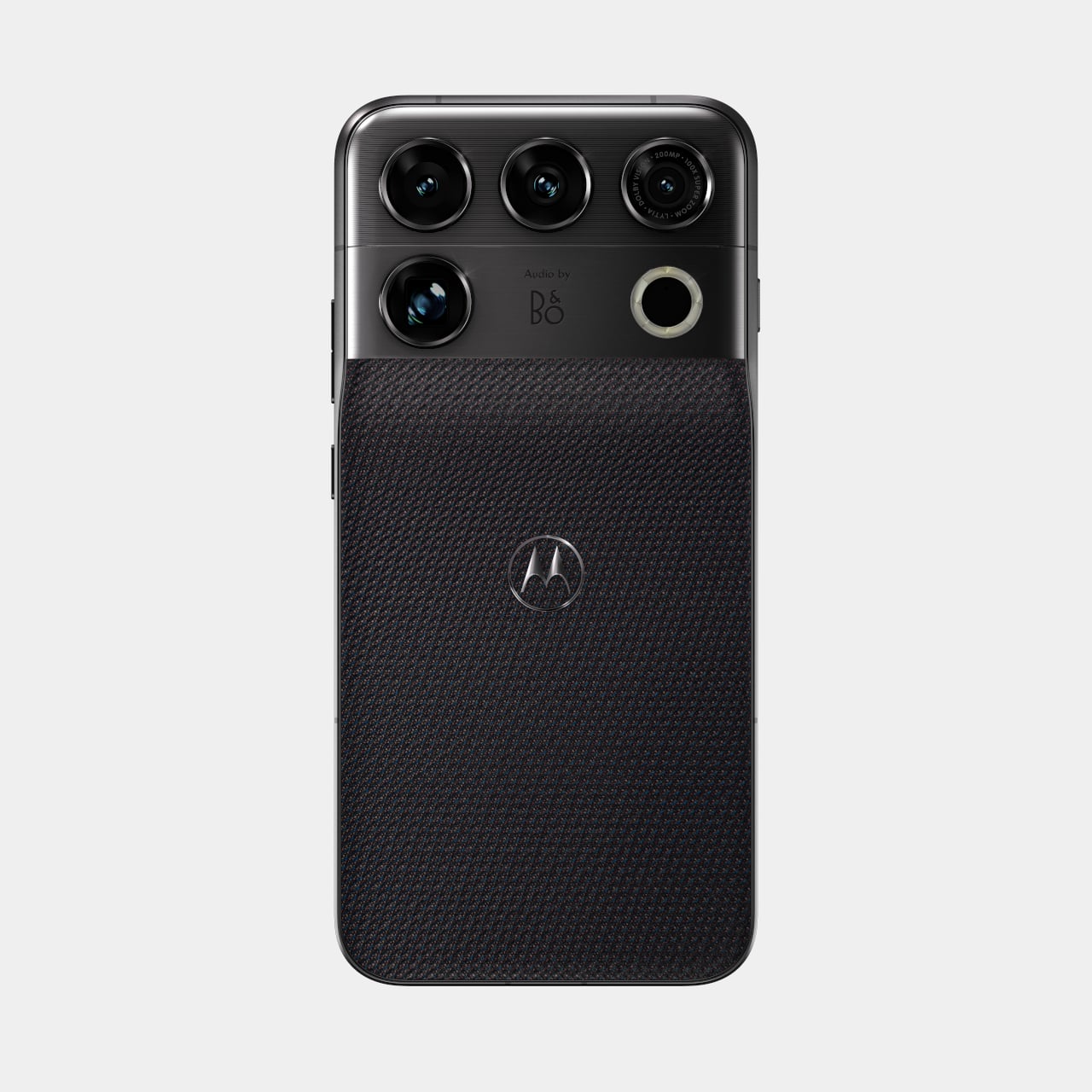 Straight-on view of the Signature 27's camera array on the Coal Smoke colorway, showing the "Audio by B&O" text, the Motorola logo, and the Tactical Weave rear texture
